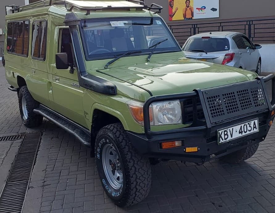 Toyota Land Cruiser safari vehicle for guided safari tour across East Africa